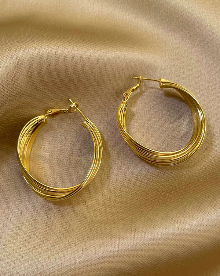 Brincos de Ouro Elegantes - Brilho Atemporal para Qualquer Ocasião