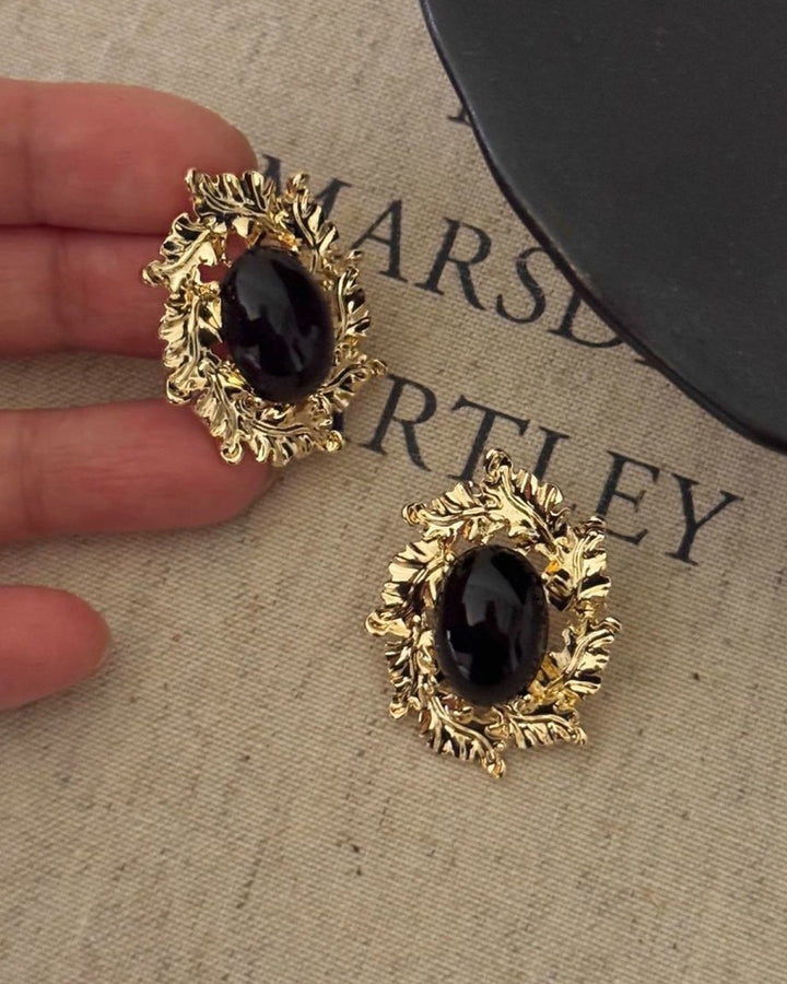 Brincos pretos elegantes