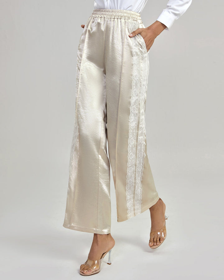 Calças casuais de cintura elástica na cor pêssego para conforto diário