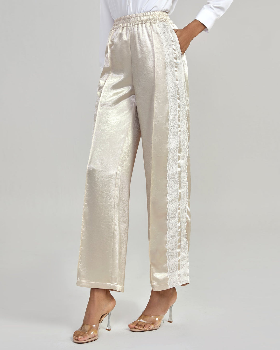 Calças casuais de cintura elástica na cor pêssego para conforto diário