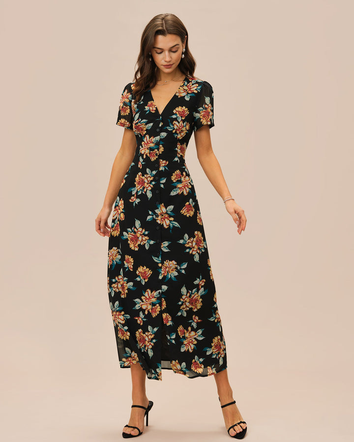 Vestido longo preto com estampa floral, decote em V e detalhe de botões frontais.