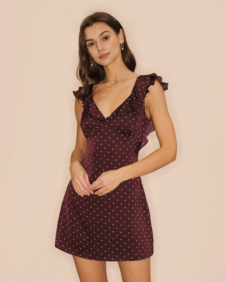 Vestido mini de cetim roxo com decote em V e bolinhas