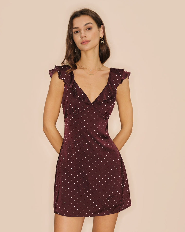 Vestido mini de cetim roxo com decote em V e bolinhas