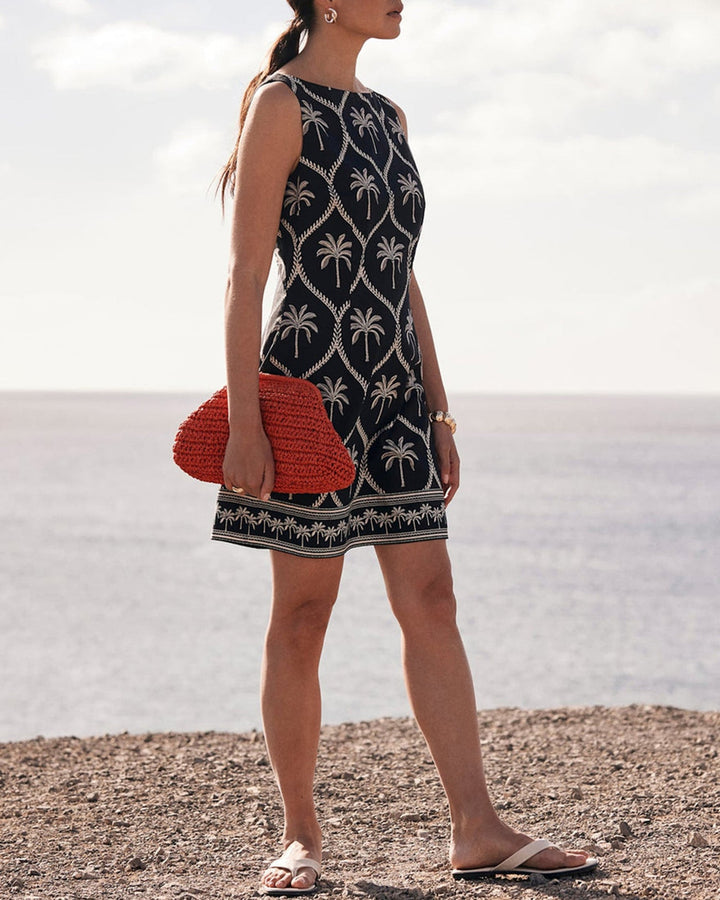 Vestido curto preto com gola barco e estampa floral - elegante e favorecedor