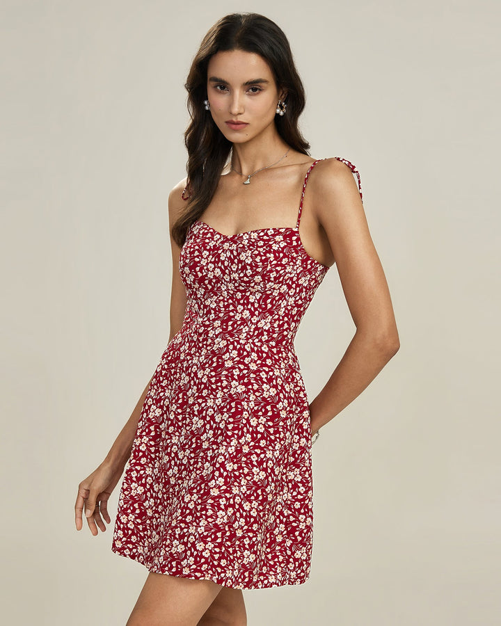 Vestido mini vermelho com estampa floral e alças de amarrar