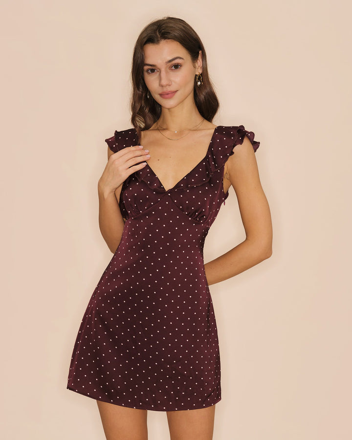 Vestido mini de cetim roxo com decote em V e bolinhas