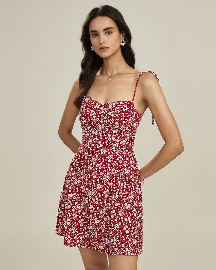 Vestido mini vermelho com estampa floral e alças de amarrar