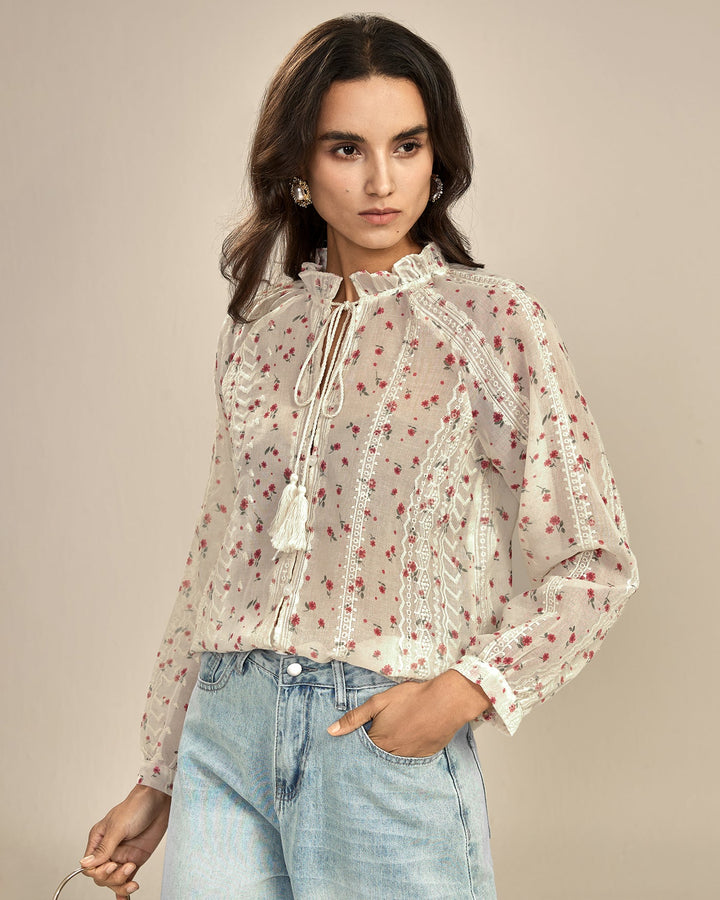Blusa floral de cor alperce com manga estilo bishop