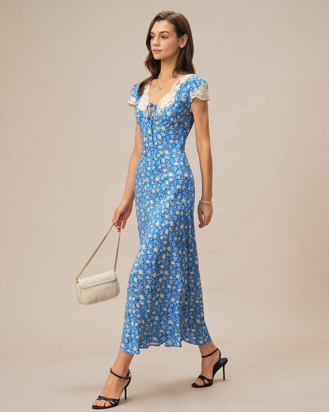 Vestido longo azul com decote em V e estampa floral elegante